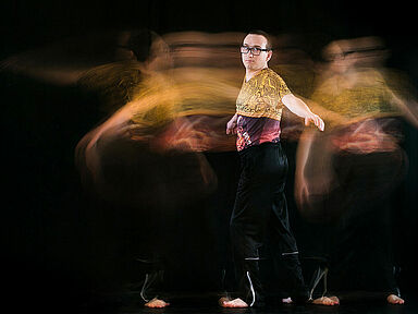 Photo d'un danseur avec un effet de flou